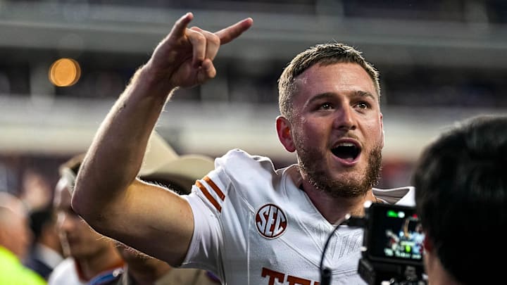 Texas Longhorns quarterback Quinn Ewers (3) celebrates the 17-7 win over Texas A&M in the Lone Star Showdown at Kyle Field on Saturday, Nov. 30, 2024 in College Station, Texas.