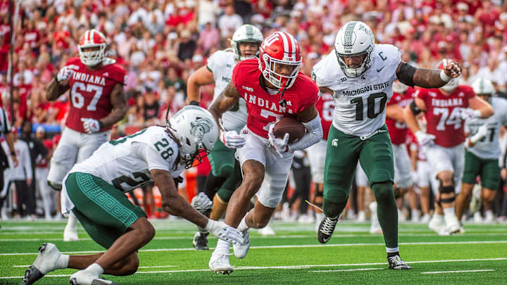 Indiana's E.J. Williams Jr. (7) heads in for a touchdown during the Indiana versus Michigan State football game at Memorial Stadium on Saturday, Oct. 18, 2025.