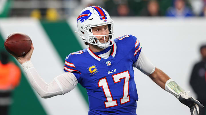 Oct 14, 2024; East Rutherford, New Jersey, USA; Buffalo Bills quarterback Josh Allen (17) throws a pass against the New York Jets during the second half at MetLife Stadium.