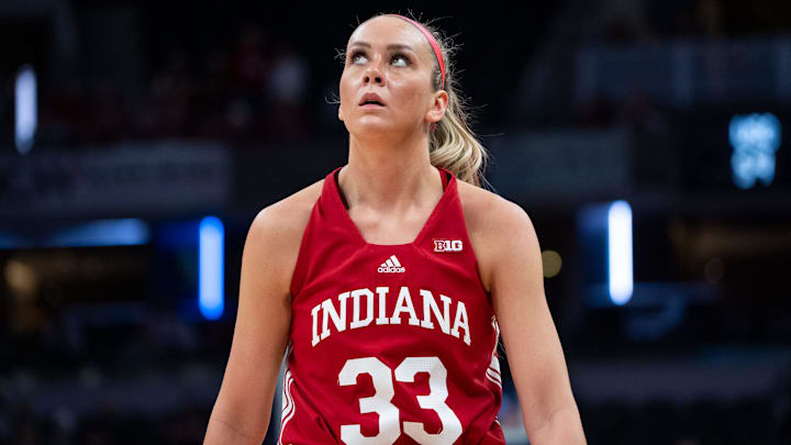 Indiana Hoosiers guard Sydney Parrish (33) looks up at the scoreboard Friday, March 7, 2025, after fouling out against the USC Trojans during the Big Ten women's tournament at Gainbridge Fieldhouse in Indianapolis.