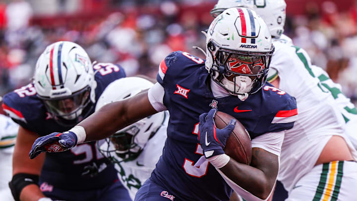Nov 22, 2025; Tucson, Arizona, USA; Arizona Wildcats running back Kedrick Reescano (3) scores a touchdown during the third quarter of the game against the Baylor Bears at Casino Del Sol Stadium. Mandatory Credit: Aryanna Frank-Imagn Images