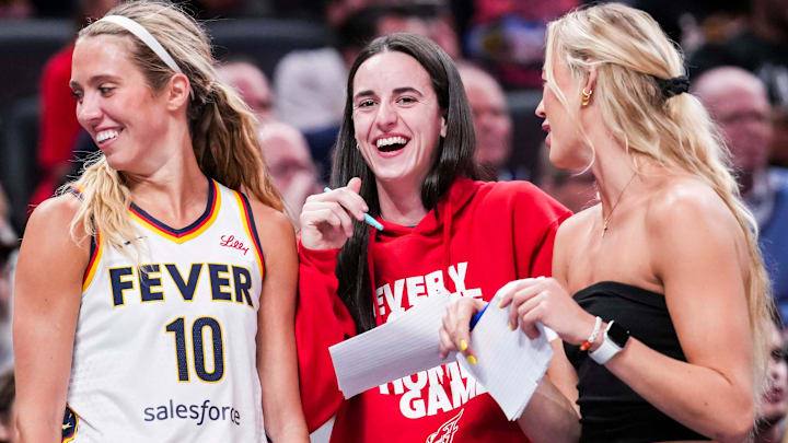 Indiana Fever guard Lexie Hull (10), Indiana Fever guard Caitlin Clark (22), and Indiana Fever guard Sophie Cunningham (8) laugh near the team bench Tuesday, June 3, 2025, during a game between the Indiana Fever and the Washington Mystics at Gainbridge Fieldhouse in Indianapolis.