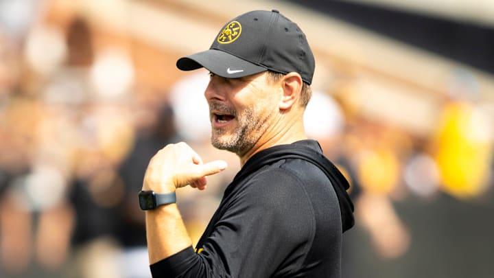 Aug 9, 2025; Iowa offensive coordinator and quarterbacks coach Tim Lester talks with players during the Hawkeyes Kids Day NCAA football open practice at Kinnick Stadium in Iowa City, Iowa. Mandatory Credit: Joseph Cress for the Des Moines Register