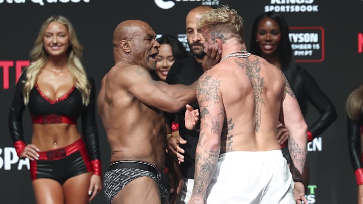 Mike Tyson slaps Jake Paul after weighing in at the Toyota Music Factory. Mike Tyson slaps Jake Paul after weighing in at the Toyota Music Factory.