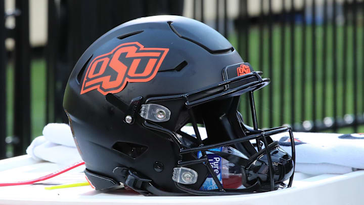 Oct 25, 2025; Lubbock, Texas, USA;  A general view of an Oklahoma State Cowboys helmet on the bench in the second half of the game against the Texas Tech Red Raiders at Jones AT&T Stadium. Mandatory Credit: Michael C. Johnson-Imagn Images