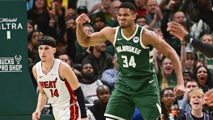Oct 30, 2023; Milwaukee, Wisconsin, USA; Milwaukee Bucks forward Giannis Antetokounmpo (34) reacts after scoring a basket as Miami Heat guard Tyler Herro (14) looks on in the fourth quarter at Fiserv Forum. Mandatory Credit: Benny Sieu-Imagn Images Oct 30, 2023; Milwaukee, Wisconsin, USA; Milwaukee Bucks forward Giannis Antetokounmpo (34) reacts after scoring a basket as Miami Heat guard Tyler Herro (14) looks on in the fourth quarter at Fiserv Forum. Mandatory Credit: Benny Sieu-Imagn Images