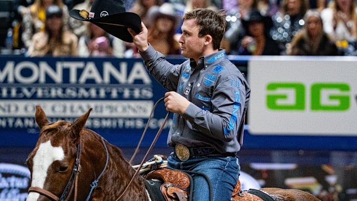 Riley Webb tipping his hat at the NFR after a good run. Riley Webb tipping his hat at the NFR after a good run.