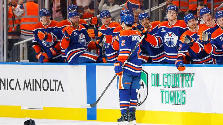 Sep 29, 2026; Edmonton, Alberta, CAN;  The Edmonton Oilers celebrate a goal scored by defensemen Evan Bouchard (2), his third goal of the game during the third period against the Vancouver Canucks at Rogers Place.  Mandatory Credit: Perry Nelson-Imagn Images