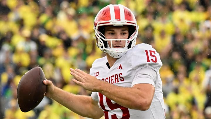 Indiana Hoosiers quarterback Fernando Mendoza (15) throws against the Oregon Ducks at Autzen Stadium. 
