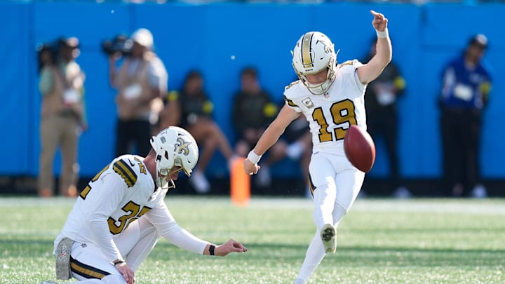 Nov 9, 2025; Charlotte, North Carolina, USA; New Orleans Saints place kicker Blake Grupe (19) kicks a field goal during the second quarter against the Carolina Panthers at Bank of America Stadium. Mandatory Credit: Jim Dedmon-Imagn Images