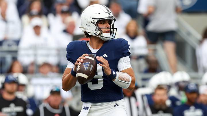 Penn State Nittany Lions quarterback Rocco Becht drops back in the pocket against the Wisconsin Badgers at Beaver Stadium. Penn State Nittany Lions quarterback Rocco Becht drops back in the pocket against the Wisconsin Badgers at Beaver Stadium.