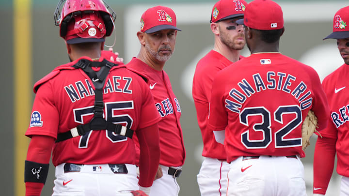 Mar 4, 2026; Fort Myers, Florida, USA;  Boston Red Sox manager Alex Cora (13) makes a pitching change in the fourth inning against the New York Yankees at JetBlue Park at Fenway South. Mandatory Credit: Jim Rassol-Imagn Images