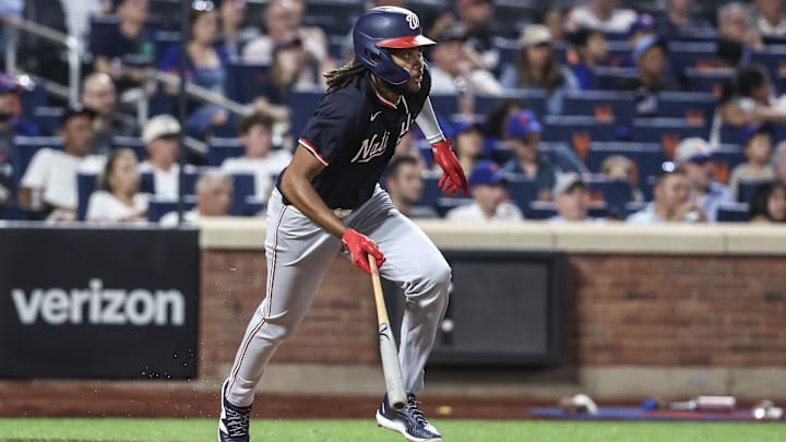 Jul 9, 2024; New York City, New York, USA;  Washington Nationals left fielder James Wood (29) hits a single in the eighth inning against the New York Mets at Citi Field.