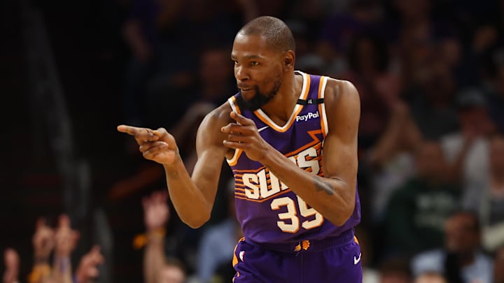 Mar 24, 2025; Phoenix, Arizona, USA; Phoenix Suns forward Kevin Durant (35) reacts against the Milwaukee Bucks at Footprint Center. Mandatory Credit: Mark J. Rebilas-Imagn Images