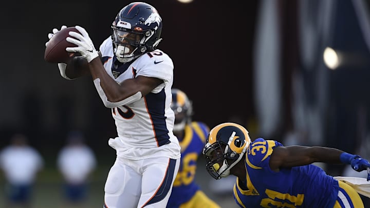 Aug 24, 2019; Los Angeles, CA, USA; Denver Broncos wide receiver Juwann Winfree (15) makes a catch in front of Los Angeles Rams cornerback Darious Williams (31) during the first half at Los Angeles Memorial Coliseum. 