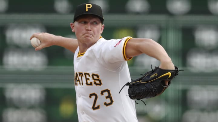 Aug 26, 2024; Pittsburgh, Pennsylvania, USA;  Pittsburgh Pirates starting pitcher Mitch Keller (23) delivers a pitch against the Chicago Cubs during the first inning at PNC Park.