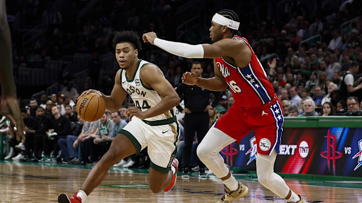 Feb 27, 2024; Boston, Massachusetts, USA; Boston Celtics guard Jaden Springer (44) drives on Philadelphia 76ers guard Ricky Council IV (16) during the second half at TD Garden. Mandatory Credit: Winslow Townson-Imagn Images