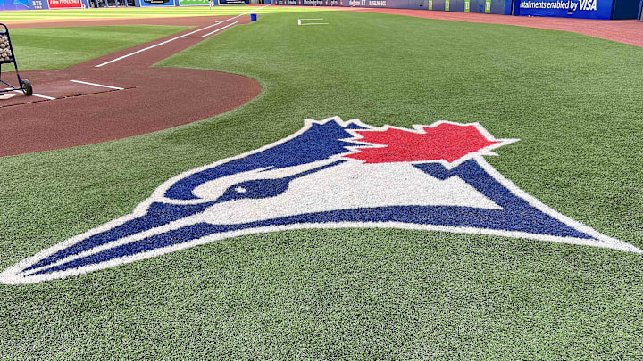 Aug 14, 2022; Toronto, Ontario, CAN; The Toronto Blue Jays logo during batting practice against the Cleveland Guardians at Rogers Centre. Mandatory Credit: Nick Turchiaro-Imagn Images Aug 14, 2022; Toronto, Ontario, CAN; The Toronto Blue Jays logo during batting practice against the Cleveland Guardians at Rogers Centre. Mandatory Credit: Nick Turchiaro-Imagn Images