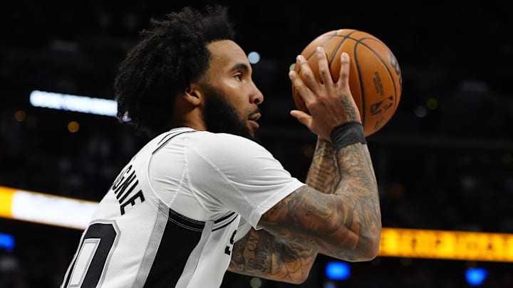 Apr 4, 2026; Denver, Colorado, USA; San Antonio Spurs forward Julian Champagnie (30) prepares to shoot the ball in the second half against the Denver Nuggets at Ball Arena. Apr 4, 2026; Denver, Colorado, USA; San Antonio Spurs forward Julian Champagnie (30) prepares to shoot the ball in the second half against the Denver Nuggets at Ball Arena.