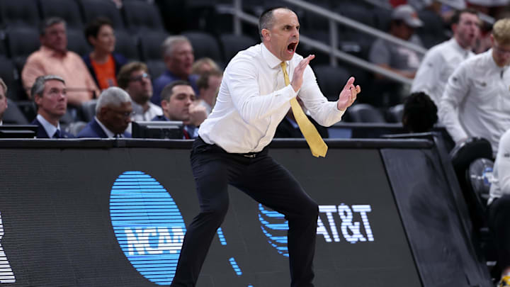 Mar 26, 2026; Houston, TX, USA; Iowa Hawkeyes head coach Ben McCollum reacts in the first half during a Sweet Sixteen game of the South Regional of the men's 2026 NCAA Tournament at Toyota Center. Mandatory Credit: Troy Taormina-Imagn Images Mar 26, 2026; Houston, TX, USA; Iowa Hawkeyes head coach Ben McCollum reacts in the first half during a Sweet Sixteen game of the South Regional of the men's 2026 NCAA Tournament at Toyota Center. Mandatory Credit: Troy Taormina-Imagn Images