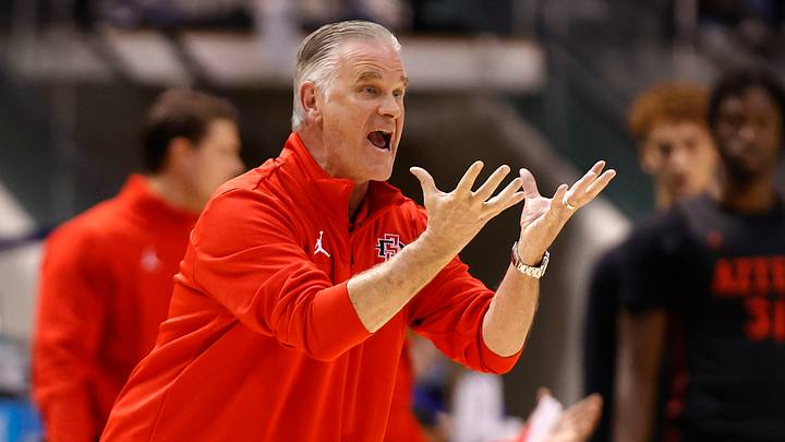 Nov 12, 2021; Provo, Utah, USA; San Diego State Aztecs head coach Brian Dutcher reacts in the first half at Marriott Center. Nov 12, 2021; Provo, Utah, USA; San Diego State Aztecs head coach Brian Dutcher reacts in the first half at Marriott Center.