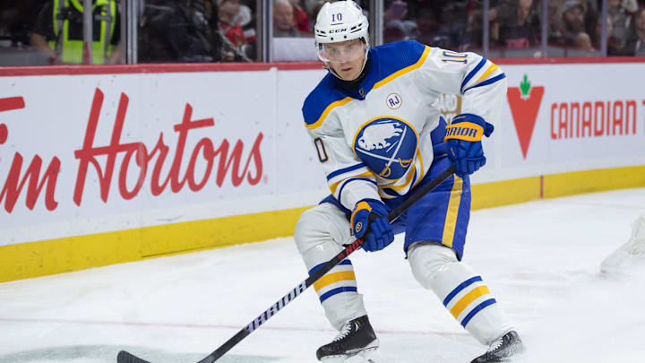 Dec 31, 2023; Ottawa, Ontario, CAN; Buffalo Sabres defenseman Henri Jokiharju (10) controls the puck