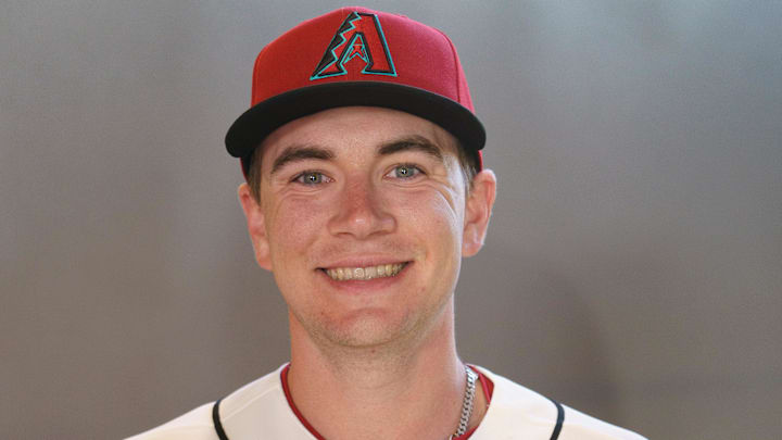 Feb 18, 2026; Scottsdale, AZ, USA; Arizona Diamondbacks pitcher Mitch Bratt (60) poses for a photo for MLB media day at Salt River Fields at Talking Stick. Mandatory Credit: Allan Henry-Imagn Images