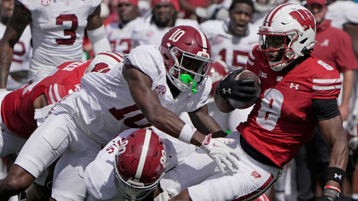 Wisconsin's Vinny Anthony II (8) is tackled by on a punt return during the third quarter of their game Saturday, September 14, 2024 at Camp Randall Stadium in Madison, Wisconsin. Alabama beat Wisconsin 42-10.