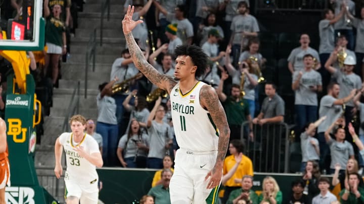 Mar 4, 2024; Waco, Texas, USA; Baylor Bears forward Jalen Bridges (11) reacts after scoring a three