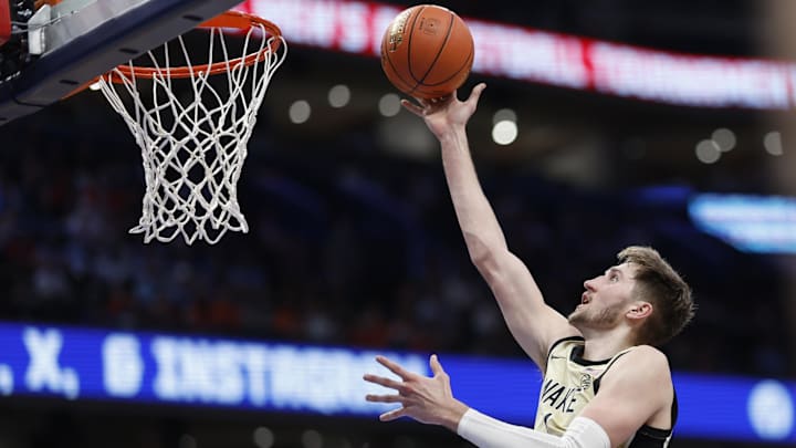Mar 14, 2024; Washington, D.C., USA; Wake Forest Demon Deacons forward Andrew Carr (11) shoots the Mar 14, 2024; Washington, D.C., USA; Wake Forest Demon Deacons forward Andrew Carr (11) shoots the