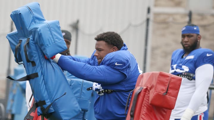 Bills defensive tackle Deone Walker hits the blocking sled during position drills during day seven of Buffalo Bills training camp at St. John Fisher University Thursday, July 31, 2025 in Pittsford, NY.