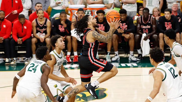 Jan 10, 2026; Waco, Texas, USA;  Houston Cougars guard Emanuel Sharp (21) scores a basket against the Baylor Bears during the second half at Paul and Alejandra Foster Pavilion. Mandatory Credit: Chris Jones-Imagn Images