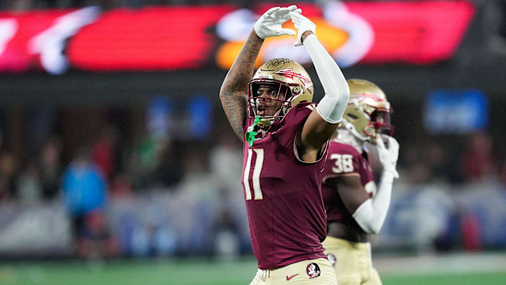 Dec 2, 2023; Charlotte, NC, USA; Florida State Seminoles defensive lineman Patrick Payton (11) reacts during the fourth quarter against the Louisville Cardinals at Bank of America Stadium. Mandatory Credit: Jim Dedmon-Imagn Images