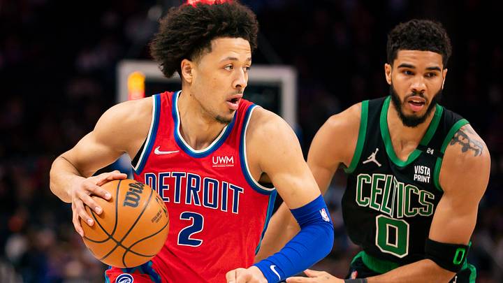 Feb 26, 2022; Detroit, Michigan, USA; Detroit Pistons guard Cade Cunningham (2) dribbles the ball against Boston Celtics forward Jayson Tatum (0) during the first quarter at Little Caesars Arena. Mandatory Credit: Raj Mehta-USA TODAY Sports Feb 26, 2022; Detroit, Michigan, USA; Detroit Pistons guard Cade Cunningham (2) dribbles the ball against Boston Celtics forward Jayson Tatum (0) during the first quarter at Little Caesars Arena. Mandatory Credit: Raj Mehta-USA TODAY Sports