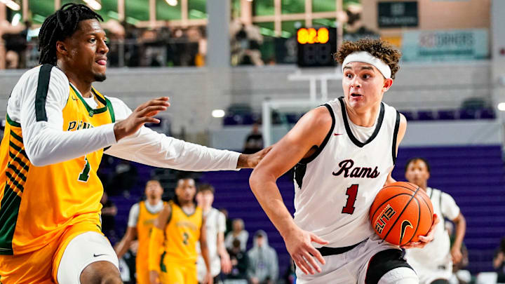 Owasso Rams guard Jalen Montonati (1) drives to the basket during the third quarter of a City of Palms Classic quarterfinal game against the Oak Ridge Pioneers at Suncoast Credit Union Arena in Fort Myers, Fla., on Friday, Dec. 20, 2024.