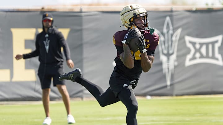 Arizona State wide receiver Jalen Moss (18) catches the ball during football practice at Kajikawa practice fields in Tempe on Aug 1, 2025.