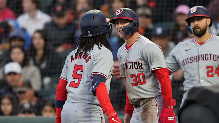 Apr 9, 2024; San Francisco, California, USA; Washington Nationals shortstop CJ Abrams (5) celebrates with center fielder Jacob Young (30) after hitting a home run against the San Francisco Giants during the third inning at Oracle Park.