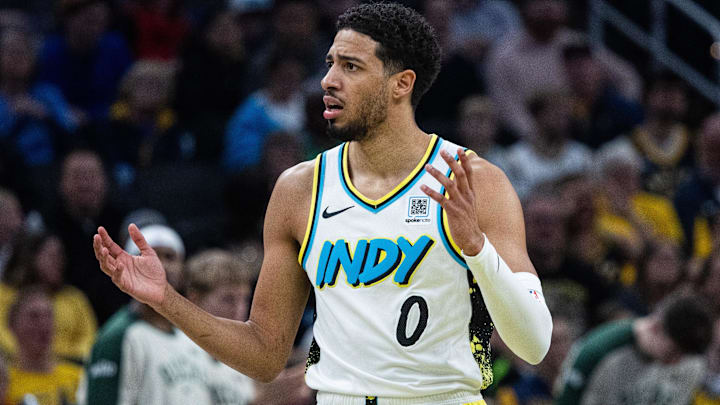 Dec 31, 2024; Indianapolis, Indiana, USA; Indiana Pacers guard Tyrese Haliburton (0) reacts to a call  in the first half against the Milwaukee Bucks at Gainbridge Fieldhouse. Mandatory Credit: Trevor Ruszkowski-Imagn Images