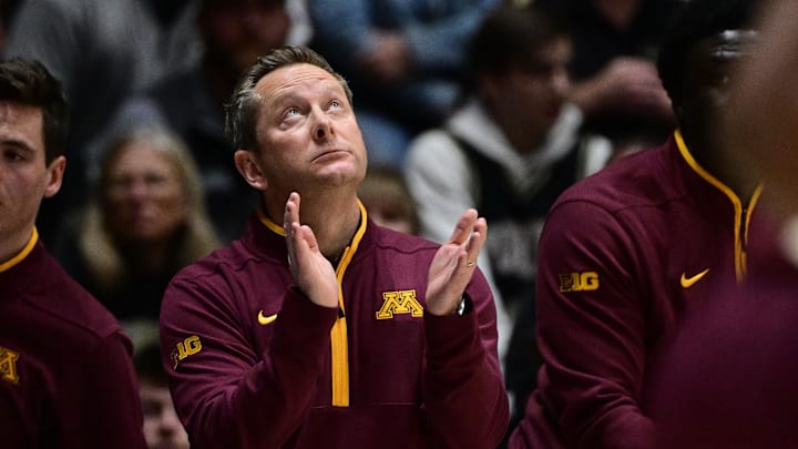 Dec 10, 2025; West Lafayette, Indiana, USA; Minnesota Golden Gophers head coach Niko Medved looks up at the video board during the first half against the Purdue Boilermakers at Mackey Arena. Mandatory Credit: Marc Lebryk-Imagn Images Dec 10, 2025; West Lafayette, Indiana, USA; Minnesota Golden Gophers head coach Niko Medved looks up at the video board during the first half against the Purdue Boilermakers at Mackey Arena. Mandatory Credit: Marc Lebryk-Imagn Images