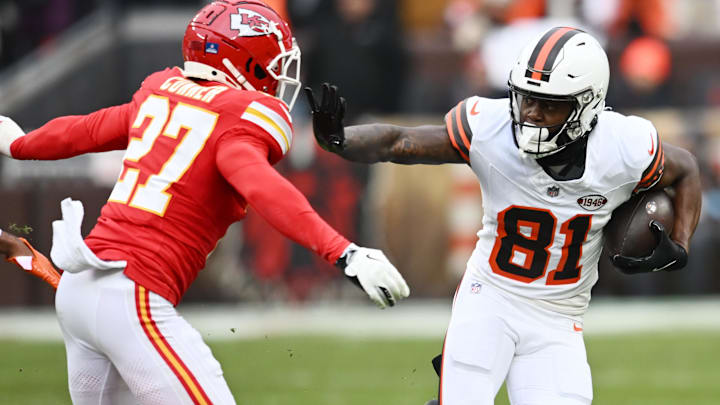 Dec 15, 2024; Cleveland, Ohio, USA; Cleveland Browns wide receiver Michael Woods II (81) runs with the ball after a catch as Kansas City Chiefs safety Chamarri Conner (27) defends during the first quarter at Huntington Bank Field. Mandatory Credit: Ken Blaze-Imagn Images
