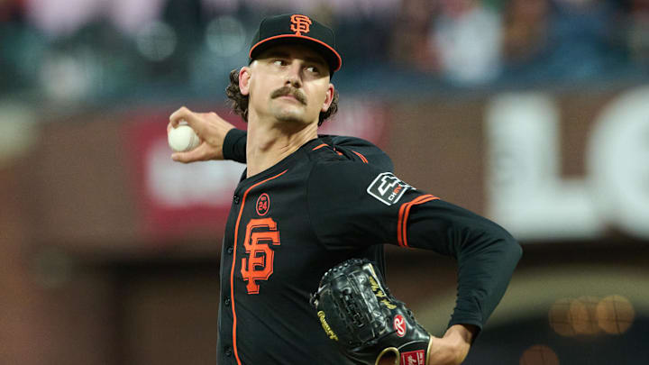 Sep 14, 2024; San Francisco, California, USA; San Francisco Giants pitcher Sean Hjelle (64) throws a pitch against the San Diego Padres during the fifth inning at Oracle Park.