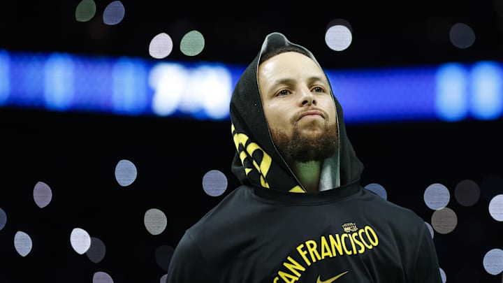 Golden State Warriors guard Stephen Curry (30) looks into the crowd during a timeout as the Warriors plays against the Charlotte Hornets.