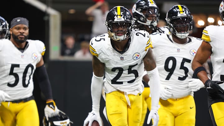 Sep 8, 2024; Atlanta, Georgia, USA; Pittsburgh Steelers safety DeShon Elliott (25) celebrates with teammates after an interception against the Atlanta Falcons in the first quarter at Mercedes-Benz Stadium. Mandatory Credit: Brett Davis-Imagn Images