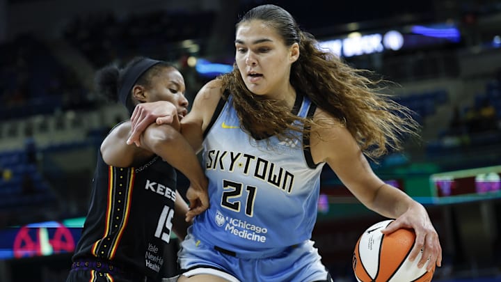 Sep 3, 2025; Chicago, Illinois, USA; Chicago Sky forward Maddy Westbeld (21) drives to the basket against Connecticut Sun guard Lindsay Allen (15) during the second half at Wintrust Arena. Mandatory Credit: Kamil Krzaczynski-Imagn Images