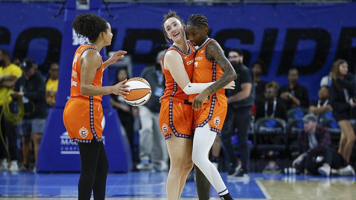 Aug 23, 2025; Chicago, Illinois, USA; Connecticut Sun guard Marina Mabrey (3) celebrates with guard Saniya Rivers (22) and guard Bria Hartley (14) teams win against the Chicago Sky in a WNBA game at Wintrust Arena.