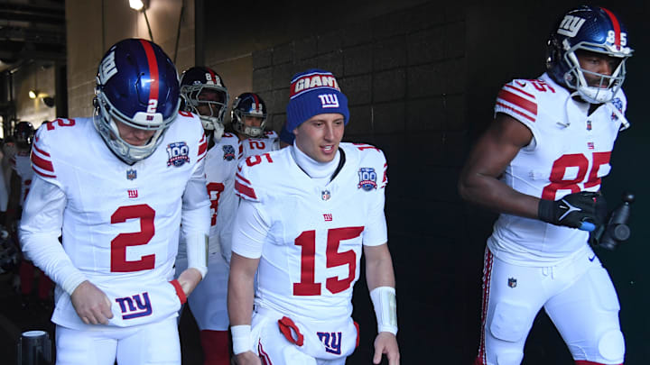 Jan 5, 2025; Philadelphia, Pennsylvania, USA; New York Giants quarterback Drew Lock (2), quarterback Tommy DeVito (15) and tight end Chris Manhertz (85) take the field against the Philadelphia Eagles at Lincoln Financial Field.  