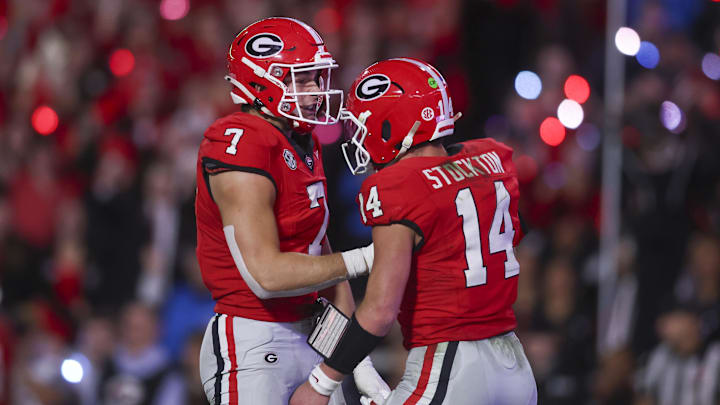 Nov 15, 2025; Athens, Georgia, USA; Georgia Bulldogs tight end Lawson Luckie (7) and quarterback Gunner Stockton (14) celebrate in the second half against the Texas Longhorns at Sanford Stadium. Mandatory Credit: Brett Davis-Imagn Images Nov 15, 2025; Athens, Georgia, USA; Georgia Bulldogs tight end Lawson Luckie (7) and quarterback Gunner Stockton (14) celebrate in the second half against the Texas Longhorns at Sanford Stadium. Mandatory Credit: Brett Davis-Imagn Images