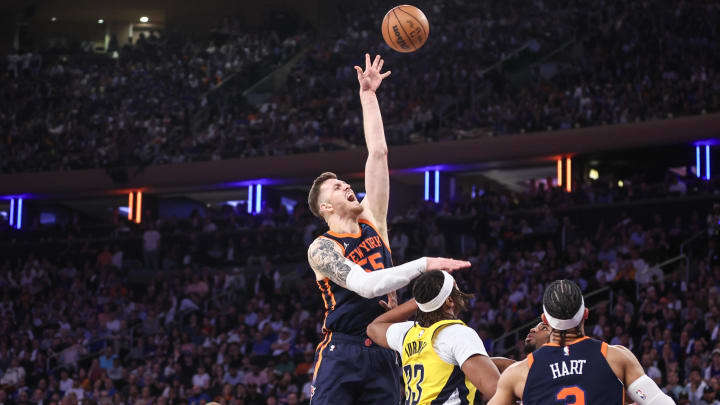 May 8, 2024; New York, New York, USA; New York Knicks center Isaiah Hartenstein (55) shoots over Indiana Pacers center Myles Turner (33) in the third quarter during game two of the second round for the 2024 NBA playoffs at Madison Square Garden. Mandatory Credit: Wendell Cruz-USA TODAY Sports