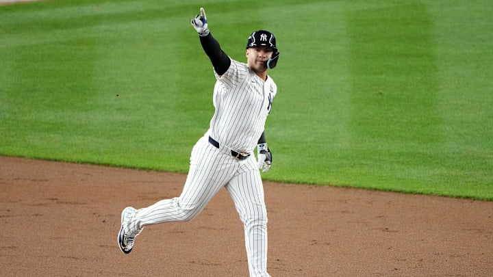 New York Yankees outfielder Alex Verdugo (24) reacts after hitting a three-run home run against the Los Angeles Dodgers in the eighth inning during game four of the 2024 MLB World Series at Yankee Stadium.