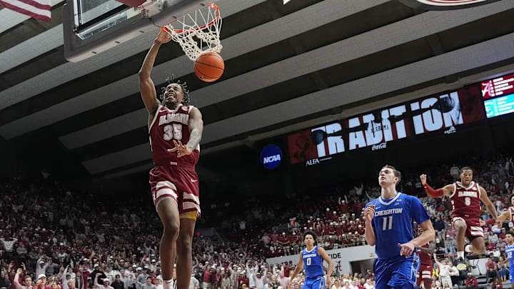 Dec 14, 2024; Tuscaloosa, Alabama, USA; Alabama forward Derrion Reid (35) gets a breakaway dunk with Creighton center Ryan Kalkbrenner (11) too far behind to defend the dunk at Coleman Coliseum. Alabama defeated Creighton 83-75. Mandatory Credit: Gary Cosby Jr.-Imagn Images Dec 14, 2024; Tuscaloosa, Alabama, USA; Alabama forward Derrion Reid (35) gets a breakaway dunk with Creighton center Ryan Kalkbrenner (11) too far behind to defend the dunk at Coleman Coliseum. Alabama defeated Creighton 83-75. Mandatory Credit: Gary Cosby Jr.-Imagn Images